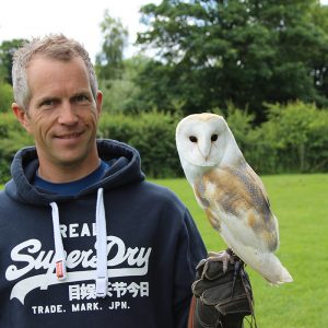 Customer holding Barn Owl